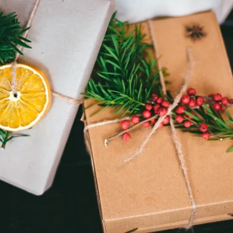 gift packages with dried lemon, greenery and twine