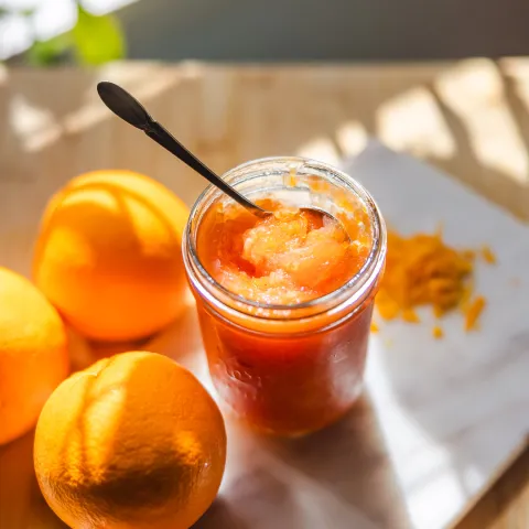 oranges and jar of orange marmalade