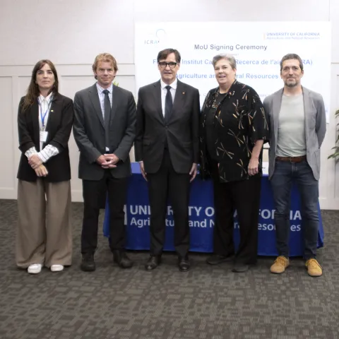 From left to right in front of MOU banner, Minister Nuria Montserrat, Director Erik Porse, Catalonian President Salvador Illa, Vice President Glenda Humiston and Director Vincenc Acunador 