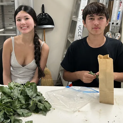 Sophie Defty and Kai Takehana Boring assist with Regenerative Ag Project