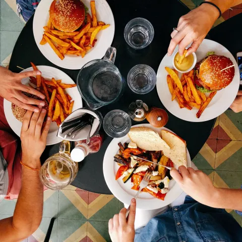 aerial view of people sharing a meal at a table