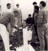 Irrigation Specialist Blaine Hanson demonstrates a low-volume irrigation system.