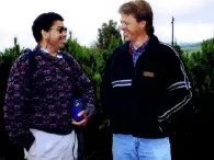 Riveside County farm advisor Aziz Baameur, left, visits with farmer Gregg Palmer.
