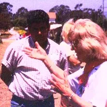 At the Watsonville agri-tourism meeting, Nita Gizdich, right, addresses participants including Ramiro Lobo, farm advisor, San Diego County.