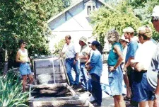 Carolyn Foxe of C&C Vermiculture discusses her organic vermiculture operation with tour members.