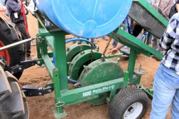 Mechanical transplanter that uses water to make holes
