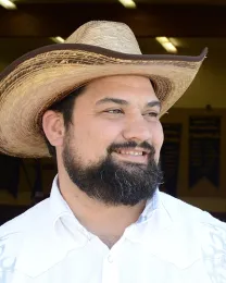 Vaca Valley 4-H Club beekeeping leader Garry Haddon has been keeping bees for four years and is sharing his knowledge. (Photo by Kathy Keatley Garvey)
