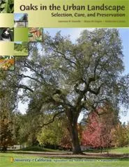 Book cover displaying an oak tree with vibrant fall colors and the title "Oaks in the Urban Landscape: Selection, Care, and Preservation."