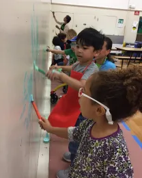 Burbank Preschool students and teachers helped paint the mural.