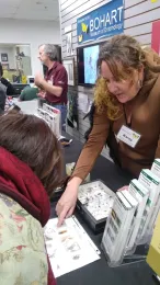 Scientists Karey Windbiel-Rojas of UC IPM and Steve Heydon of the Bohart Museum of Entomology answer questions at the open house. (Photo by Tabatha Yang)