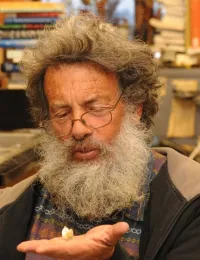 UC Davis lepidopterist Art Shapiro, distinguished professor of evolution and ecology, with one of the winners he collected. (Photo by Kathy Keatley Garvey)