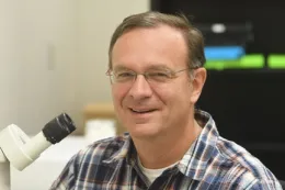 UC Davis professor Jason Bond gives us 5 reasons to like spiders. (Photo by Kathy Keatley Garvey)