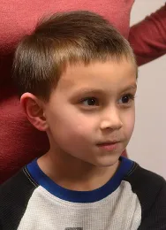 Logan Loss, 6, of Rocklin, talks about scorpions. (Photo by Kathy Keatley Garvey)