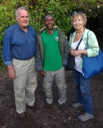 Jim and Patty Carey with guide, they were on their way from Rwanda to Congo for the mountain gorilla trek in Goma, Congo.