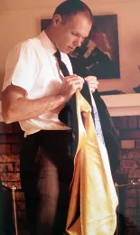 Robbin Thorp getting his gown ready for graduation ceremonies (Ph.D) at UC Berkeley in 1964. (Photo courtesy of daughter Kelly McKee)