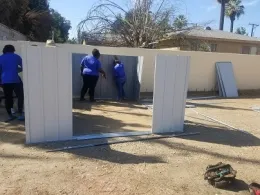 Job Corps youth assembling the garden shed