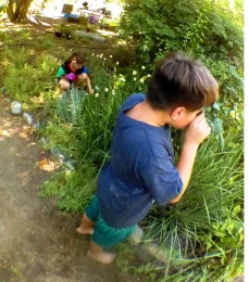 Children investigating sights and smells in the garden.