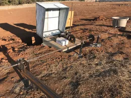 Drive Motor and drive axle assembly to move rainout structures over plots during rain events.