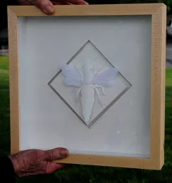 A close-up of Marilyn Judson's paper sculpture of a honey bee. (Photo by Kathy Keatley Garvey)