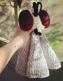 This crocheted robber fly, the work of former UC Davis doctoral student Rebecca Godwin, holds a special place in Griffin Albert's crib. He may be he only baby with a crocheted robber fly toy in his crib.