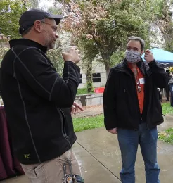 UC Davis medical entomologist-geneticist Geoffrey Attardo (right), a global authority on tsetse flies, chats with Professor Jason Bond, a global authority on spiders. (Photo by Kathy Keatley Garvey)