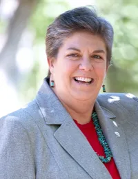 Headshot of Glenda Humiston standing and smiling outdoors.