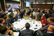 People sit around a table