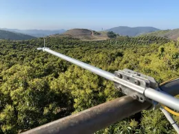 Fig .3. A look from the top of flux tower demonstrates Net Radiometer sensor and two fine Thermocouple sensors, and an area of experimental orchard