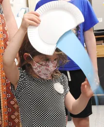 Ellie Lindquist, 4, of Woodland displays her tadpole shrimp puppet. (Photo by Kathy Keatley Garvey)