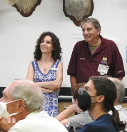 Communications specialist Julia Boorinakis Harper Barbeau of the Placer Land Trust and Bohart associate Greg Kareofelas smile at the crowd reaction to a dogface butterfly video. (Photo by Kathy Keatley Garvey)