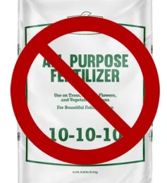 A bag of all-purpose fertilizer with a red prohibition symbol overlay, indicating it should not be used.