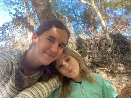 Photo of Anna with her young daughter.