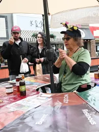 Amina Harris, director of the UC Davis Honey and Pollination Center, staffed an educational booth on how to taste honey. She is the co-founder of the California Honey Festival with the City of Woodland. (Photo by Kathy Keatley Garvey)