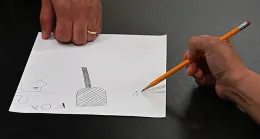 Nancy Ruiz sketched this illustration of a fly swatter and a fly.