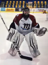 Murray Isman enjoying hockey.