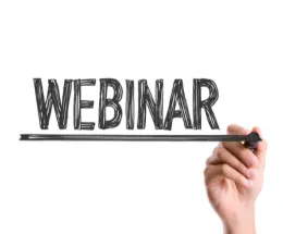The word webinar written on a board.