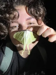 Sol Wantz getting acquainted with a butterfly.
