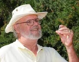 Robbin Thorp (1933-2019), UC Davis distinguished emeritus professor, examining a bumble bee. (Photo by Kathy Keatley Garvey)