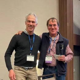 Michael Cahn, left, poses with Richard Smith.