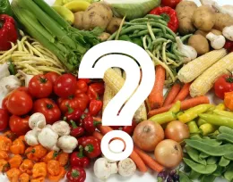 Photo of mixed vegetables with a large question mark on top.