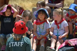 Day Camp teen staff talking to two day campers