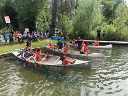 Resident Campers getting into canoes