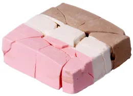 Freeze-dried astronaut ice cream layered with pink, white, and brown.