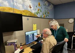 Helpdesk Lucy Duquette and Jon Schwartz