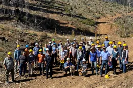 Group photo of forestry field tour participants.