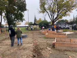 Learning Garden with Master Gardeners building new beds.