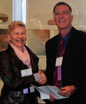 Joe DiTomaso being presented the WSWS Fellow award by Jill Schroeder, Chair of the Fellows Committee