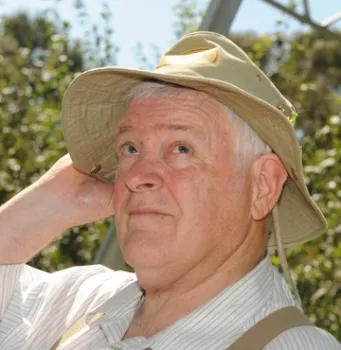 Allan Jones didn't find this praying mantis--it found him. (See upper right corner of his hat.)But he did find the first bumble bee of the year on Jan. 27 in four-way contest covering the Yolo County area. (Photo by Kathy Keatley Garvey)