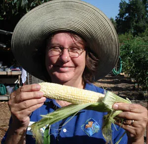 Showing off a full ear of corn