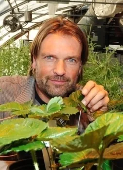 Christian Nansen in his UC Davis greenhouse (Photo by Kathy Keatley Garvey)